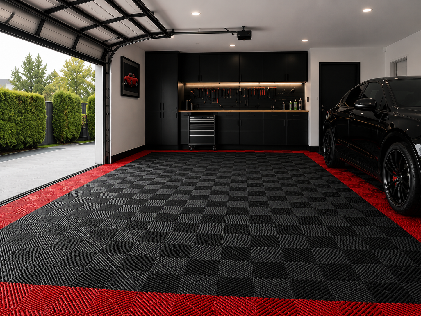 Black modular garage flooring with red border layout